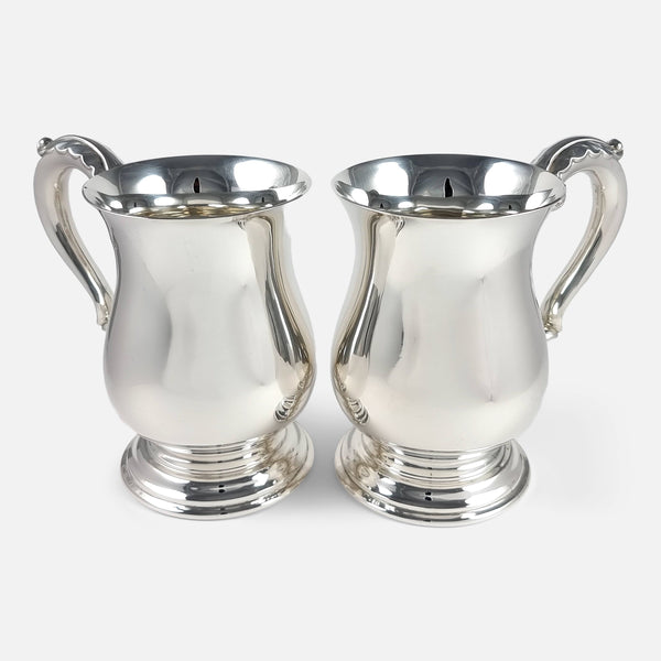 the pair of George VI sterling silver mugs