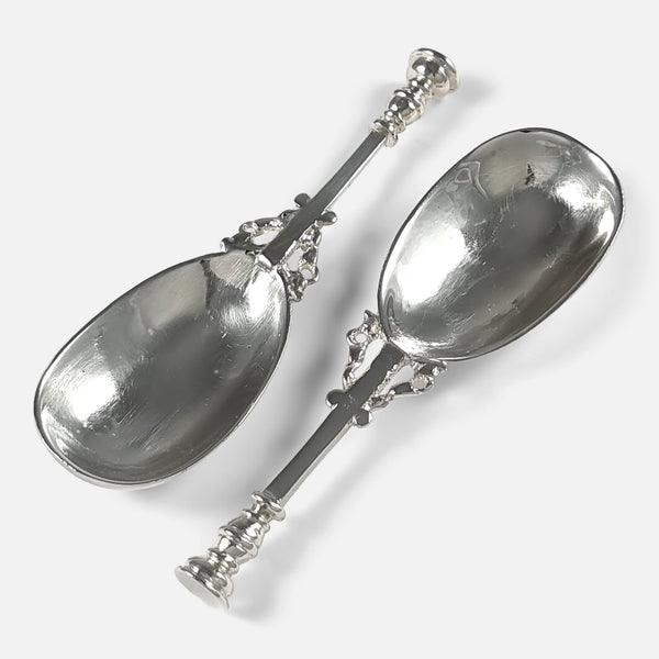 the pair of Arts and Crafts style tea caddy spoons by Amy Sandheim, viewed from above