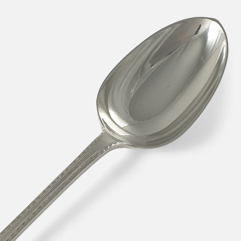 focused on the bowl of one of the spoons