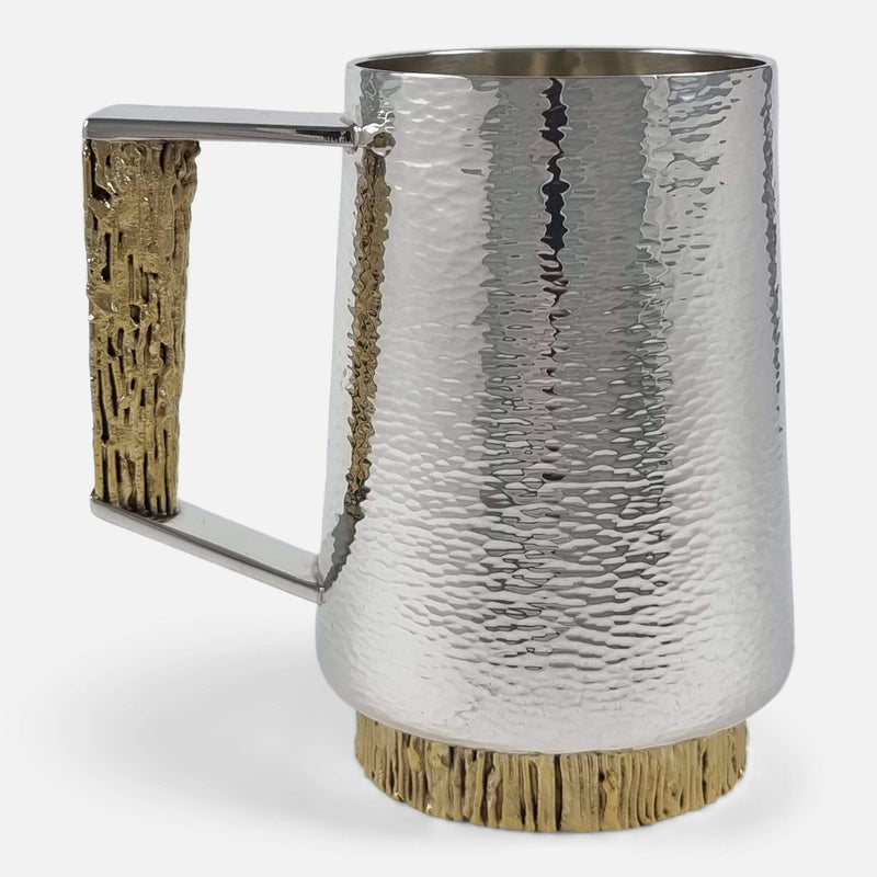 a side on view of the mug with handle to the left side
