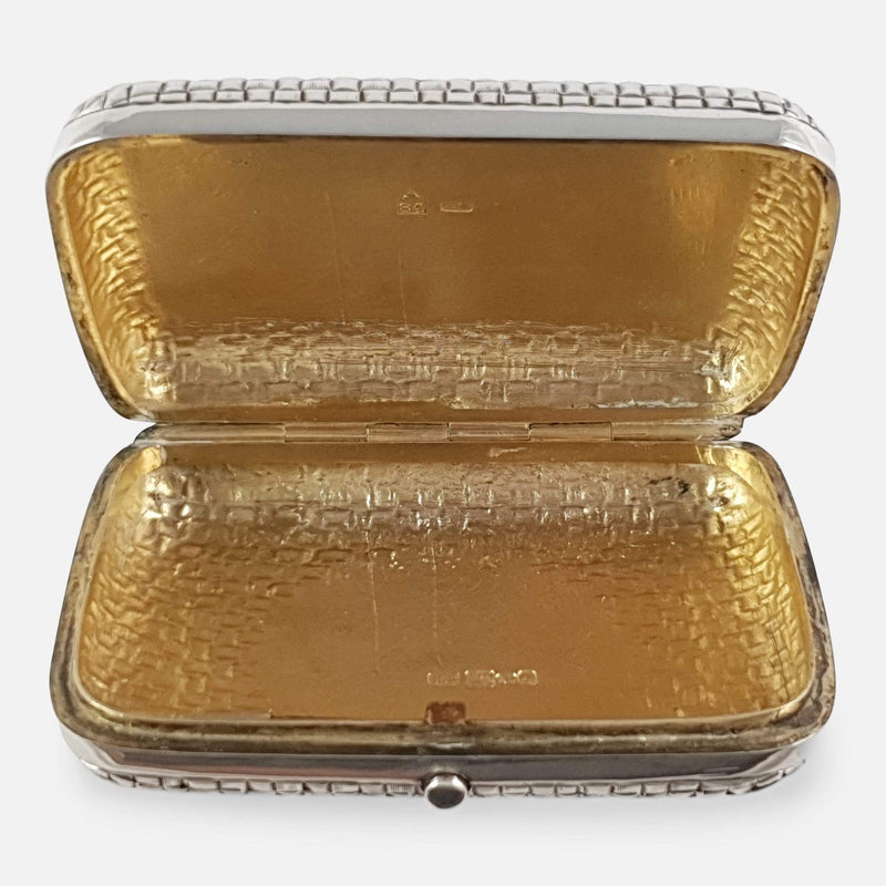 a view inside the silver gilt box with the lid opened