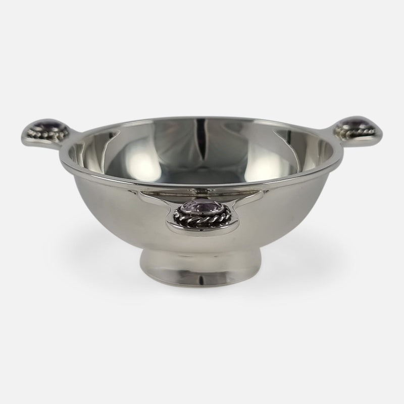a view of the Quaich with one of the handles to the forefront