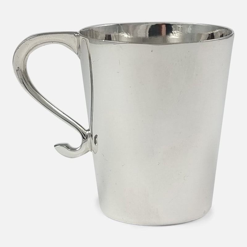 one of the cups viewed side on with handle pointing to the left