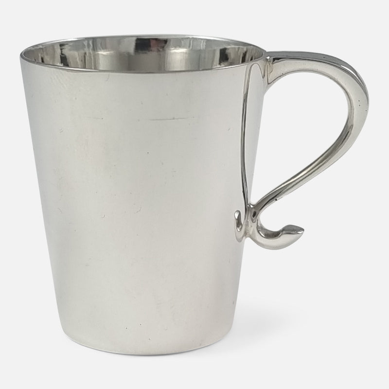 one of the cups viewed side on with handle pointing to the right