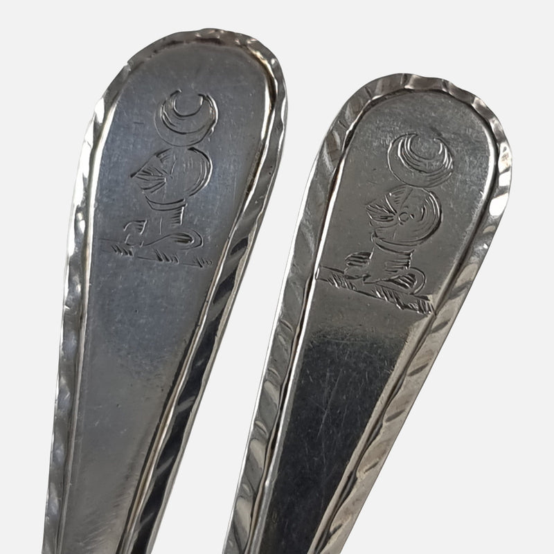 the engraved crests to the teaspoons terminals