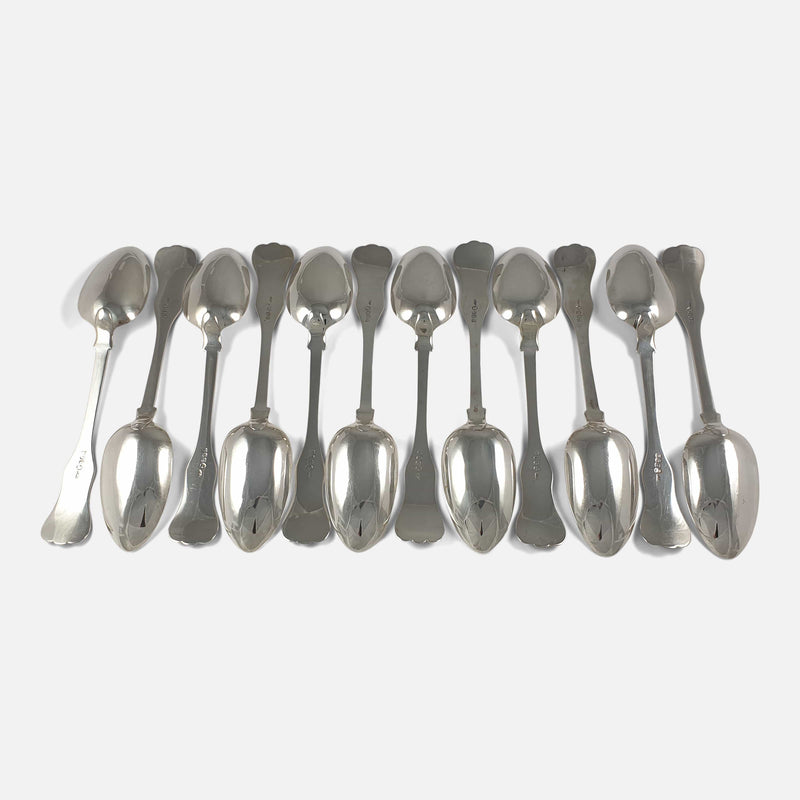 the back of the 12 spoons viewed in a row