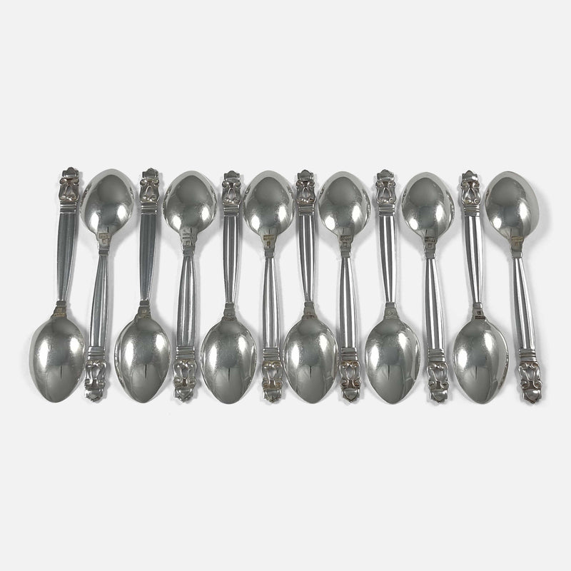 the set of 12 teaspoons face down