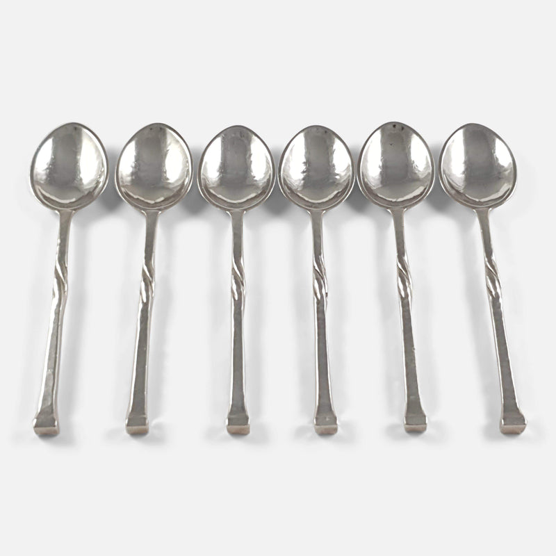 the 6 sterling silver spoons viewed from above