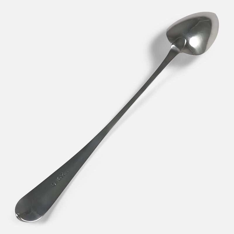 one of the basting spoons face down and viewed diagonally