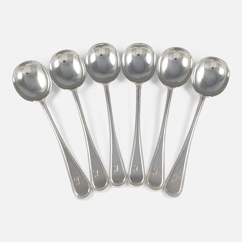 the set of 6 silver soup spoons viewed together in a fanned out shape