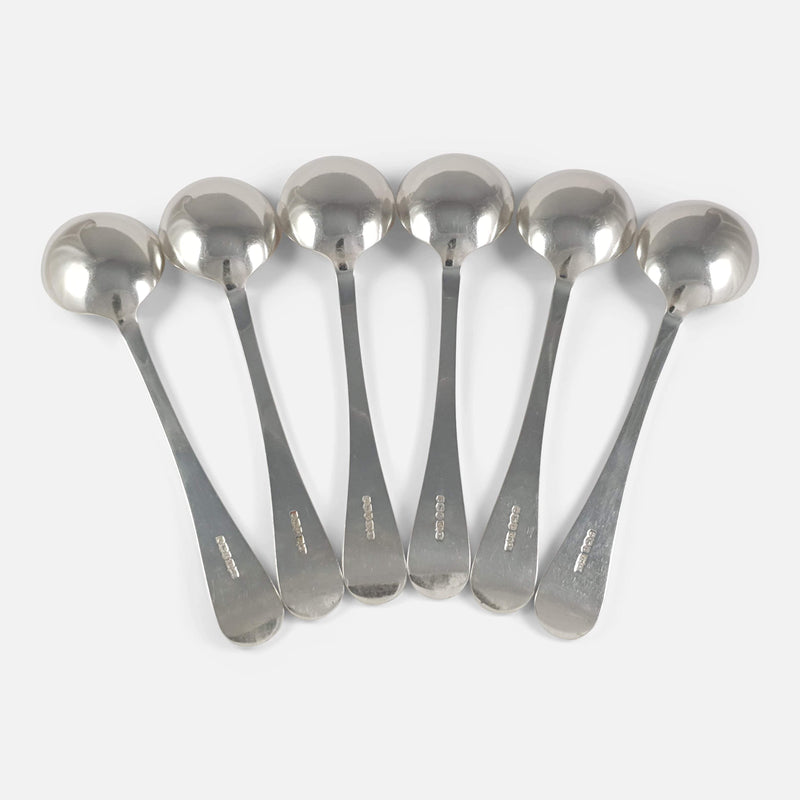 the spoons face down looking at the backs