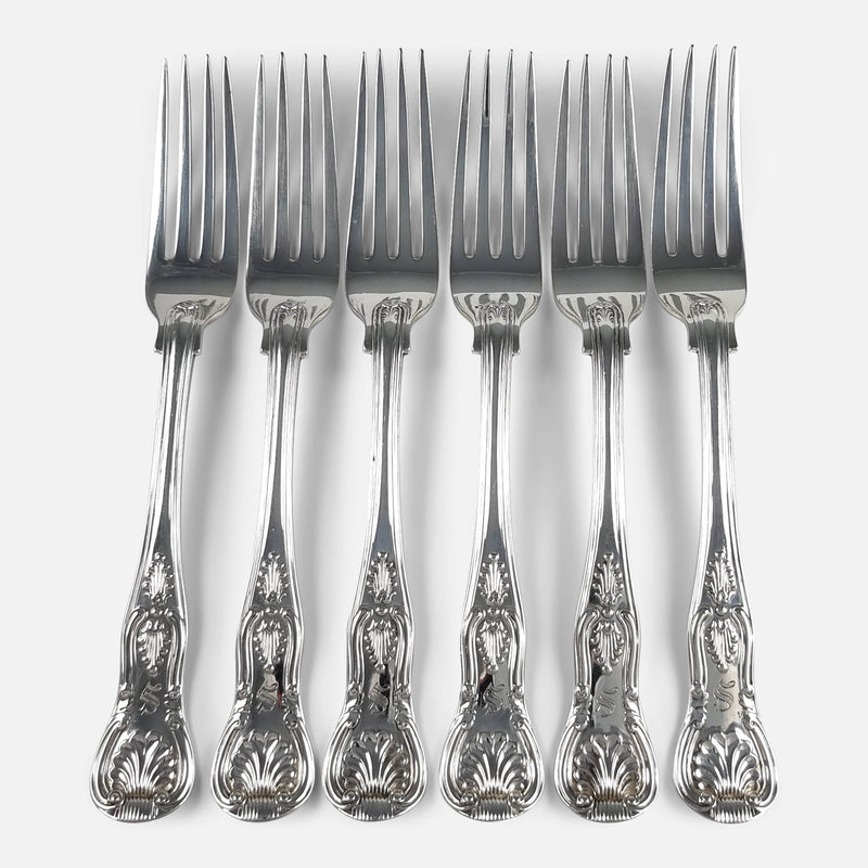 the set of sterling silver kings pattern forks viewed from above