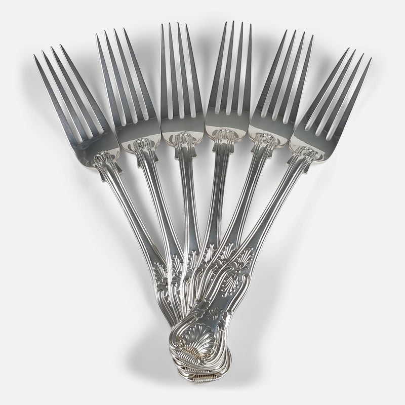 the set of forks laid out in a fan formation