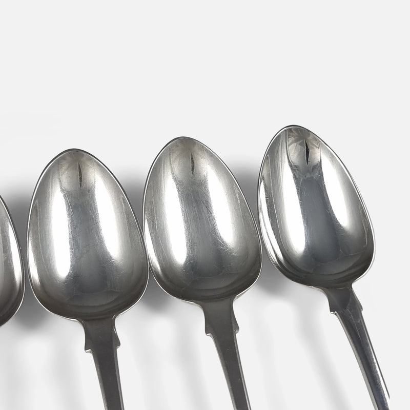 focused on the bowls to three of the teaspoons