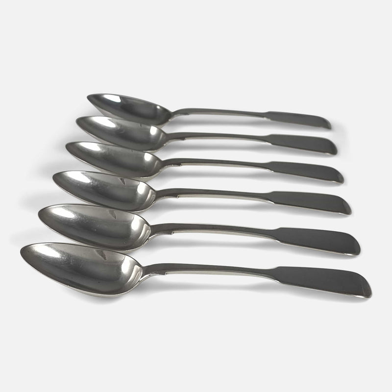 the teaspoons viewed in a row and side on