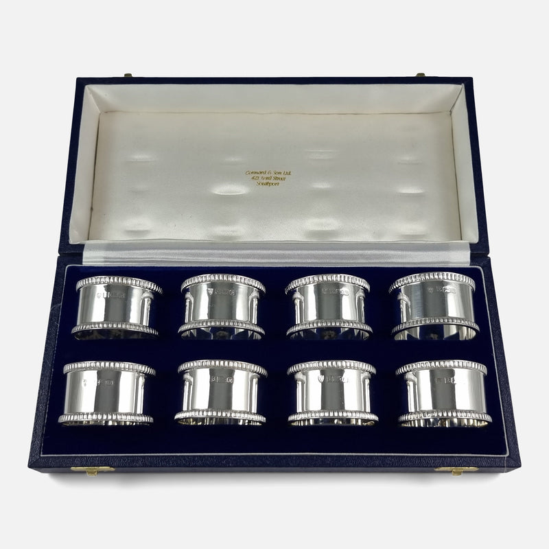the Elizabeth II sterling silver napkin rings viewed in their case