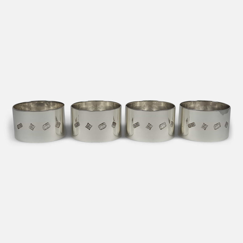 the napkin rings in a row with hallmarks to the forefront