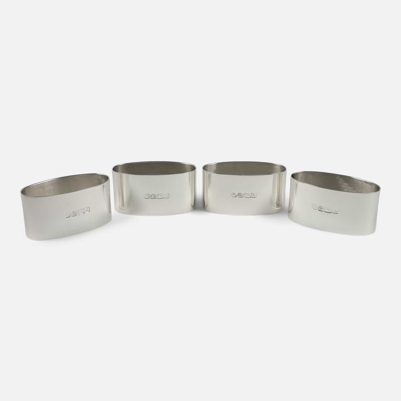 the four napkin rings presented in a semi circle