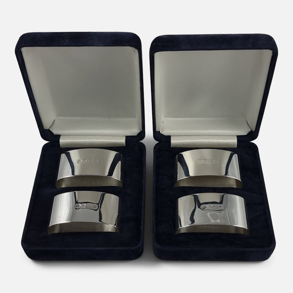 the sterling silver napkin rings viewed in their boxes