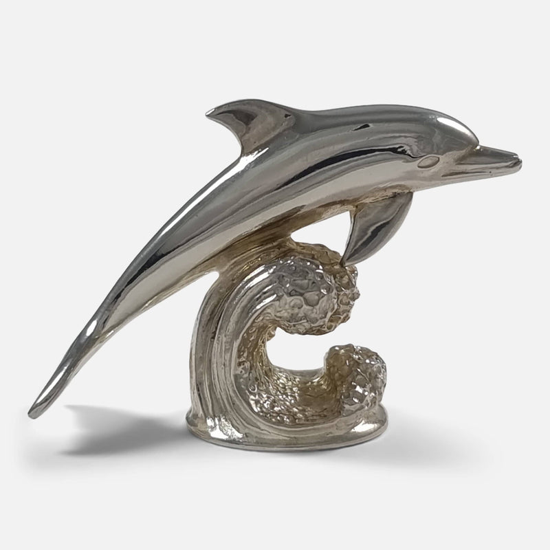 one of the dolphin menu holders side on facing right