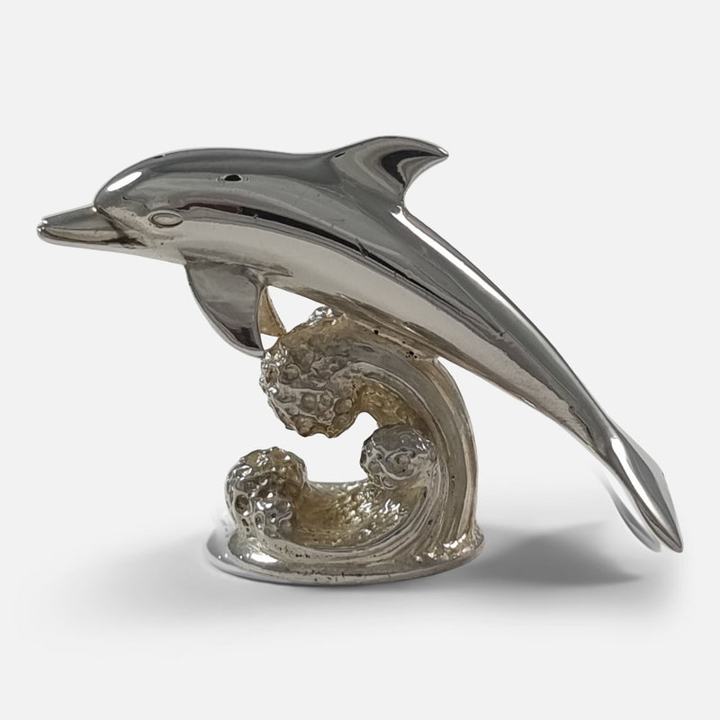 one of the dolphin menu holders side on facing left