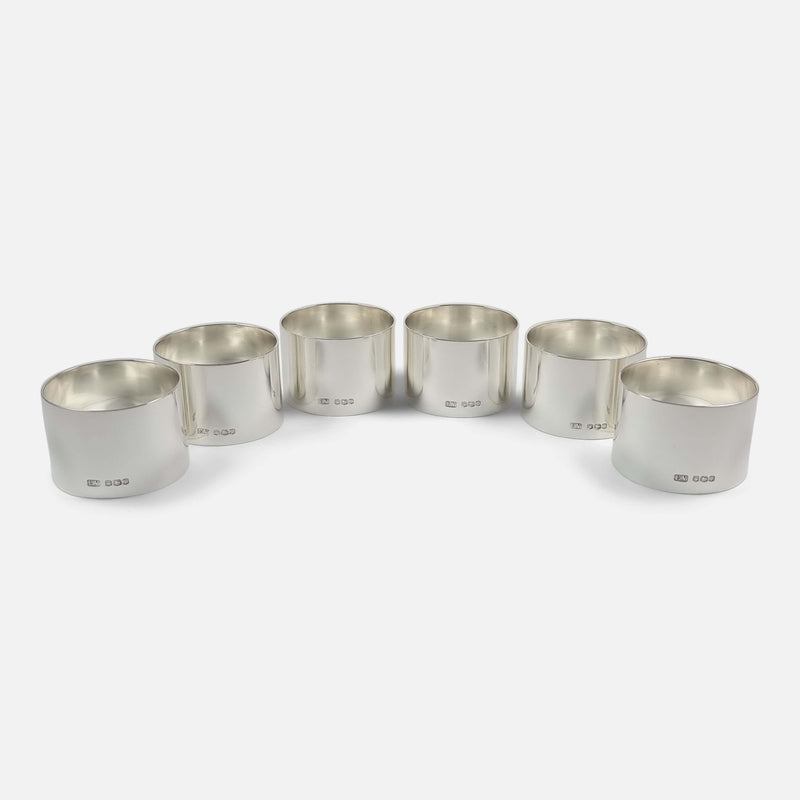 the napkin rings spread out in a crescent formation