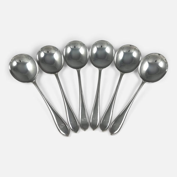 the set of six sterling silver Sandringham pattern soup spoons viewed from above