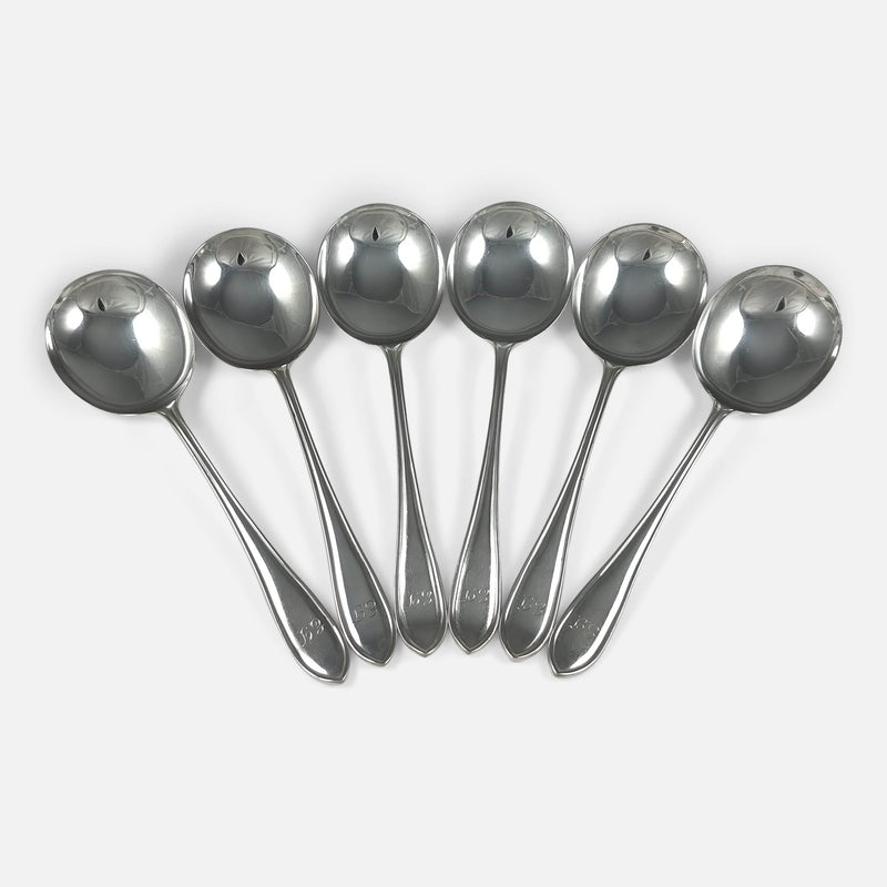 the set of six sterling silver Sandringham pattern soup spoons viewed from above