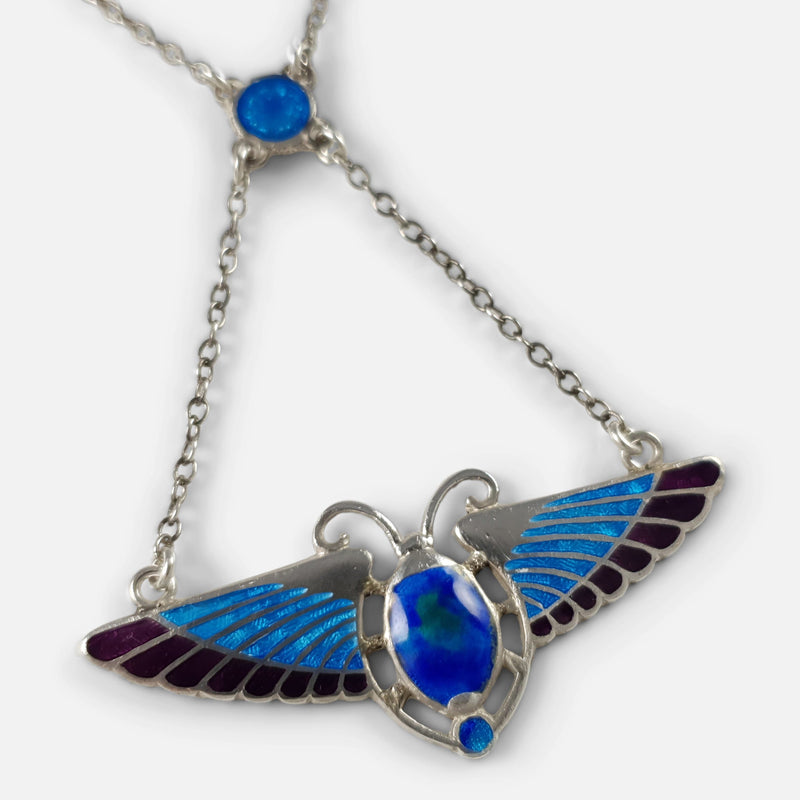 focused on the winged scarab pendant