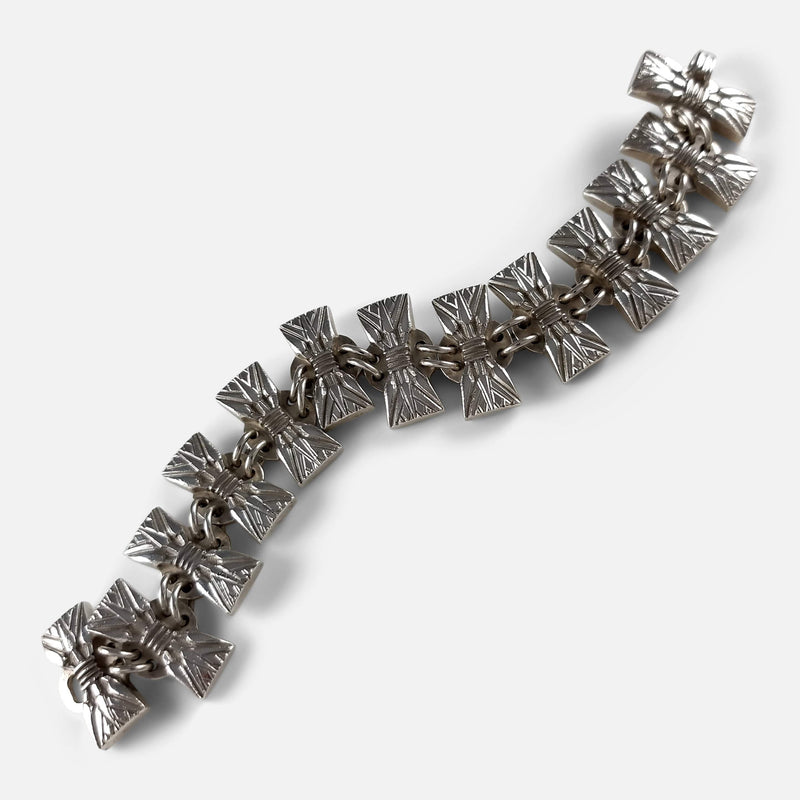 the bracelet viewed diagonally in a snaking formation