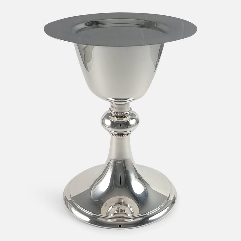 the paten resting on top of the chalice