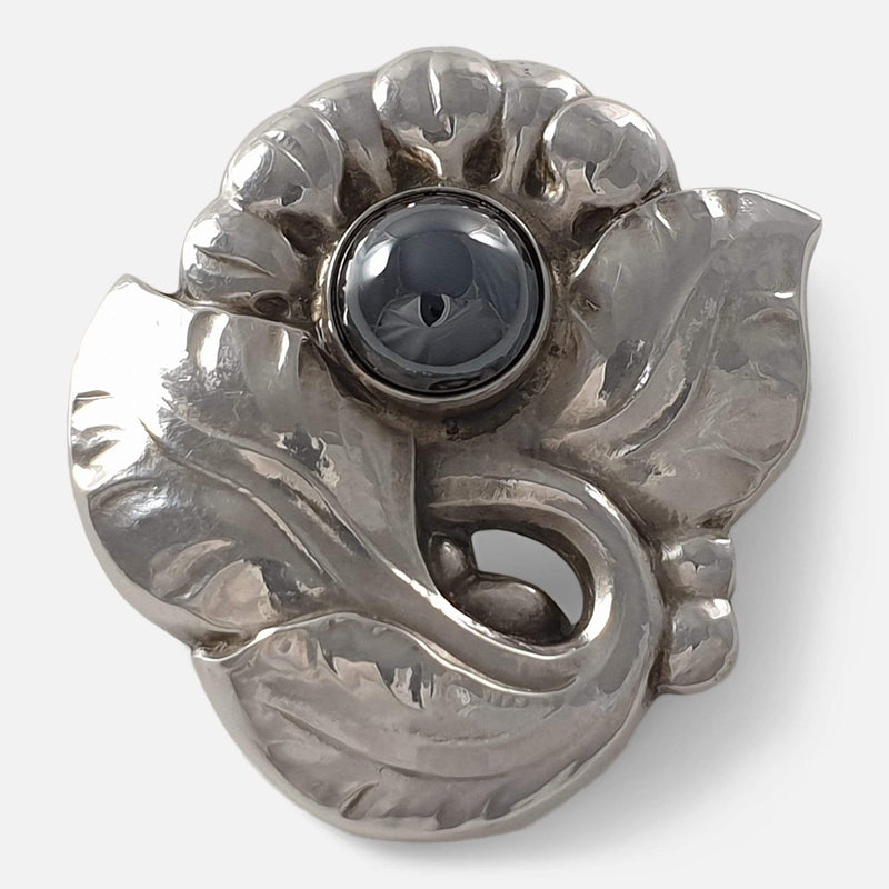 the Georg Jensen silver and hematite brooch viewed from the front