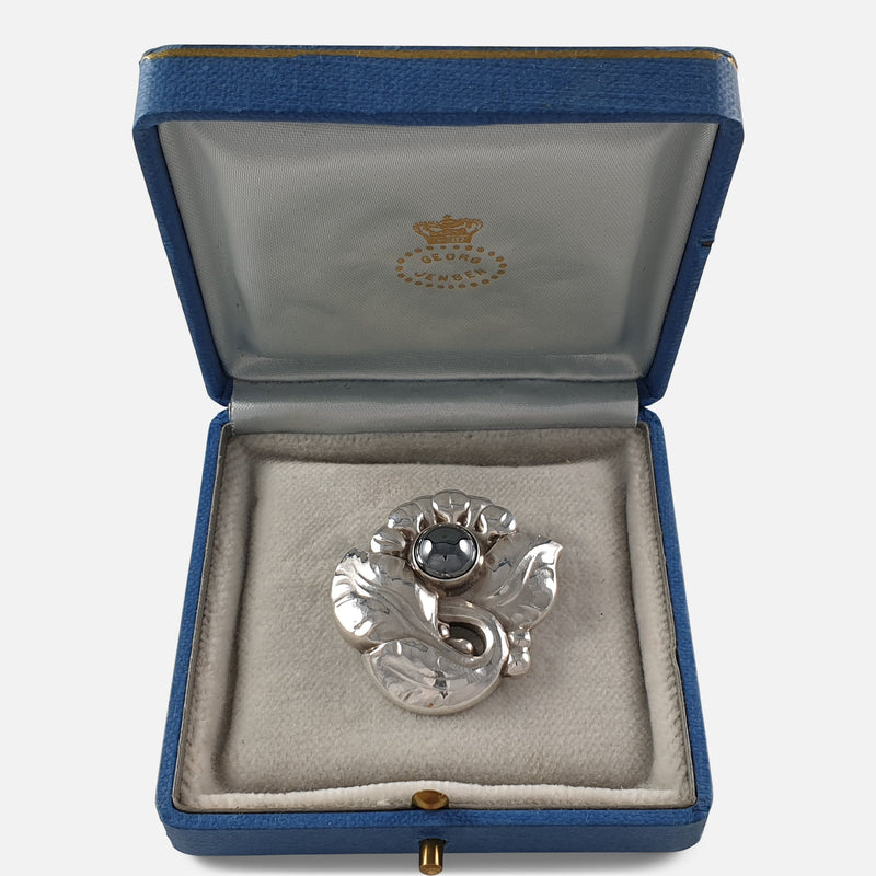 the brooch in its box