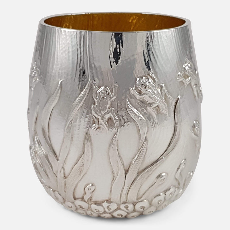 the silver beaker to include the chased decoration