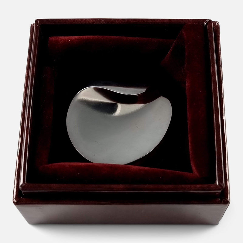 the brooch in its box with lid opened