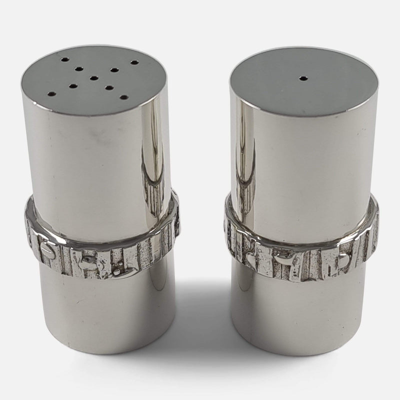 the salt and pepper shakers viewed from a slightly raised position