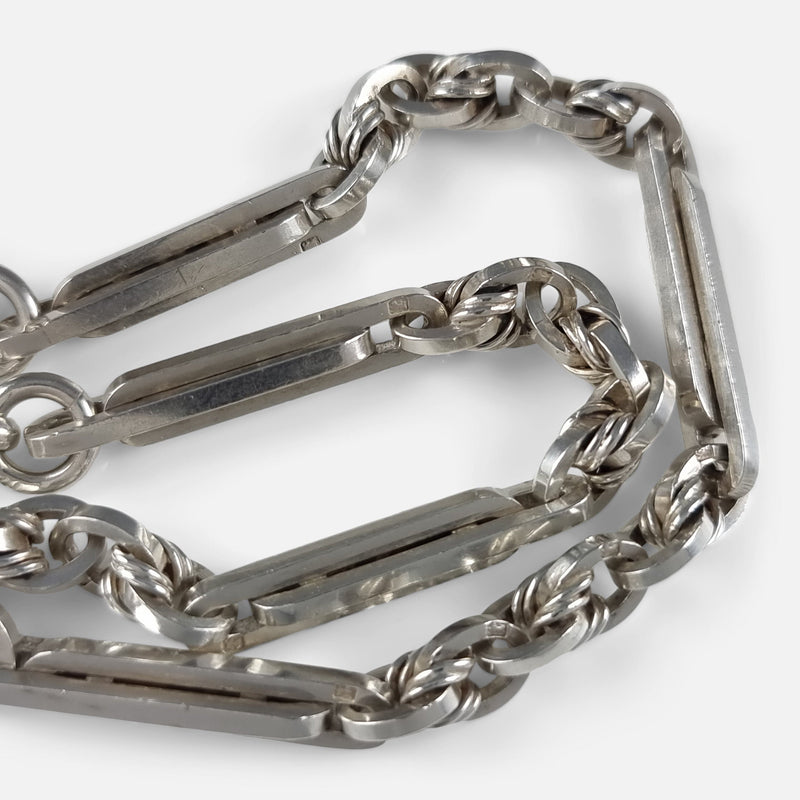 focused on a number of the chain links