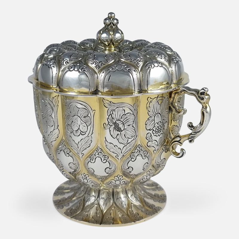 the cup rotated with handle to the forefront and pointing slightly towards the right