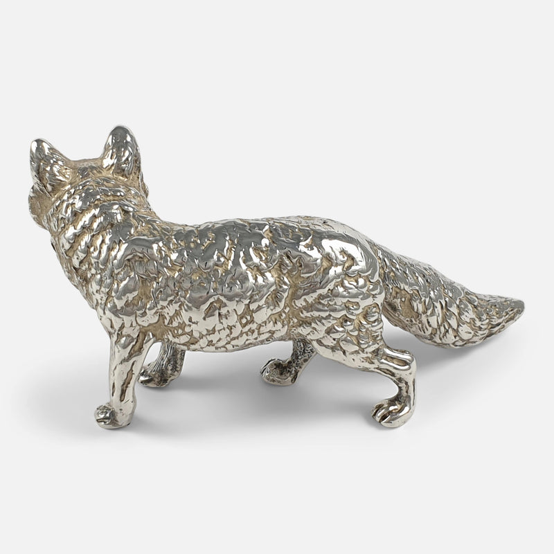 the fox side on facing away, and viewed from a slightly raised position