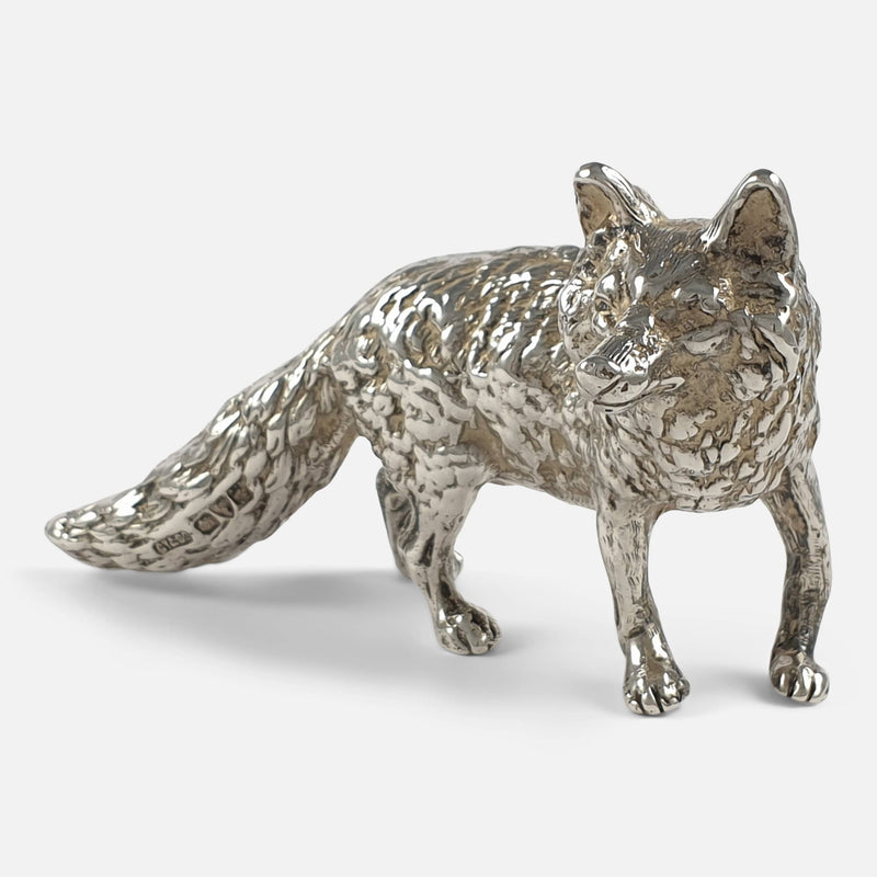 the fox at an angle with head to forefront
