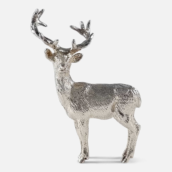 the sterling silver model stag with head turned. Viewed side on