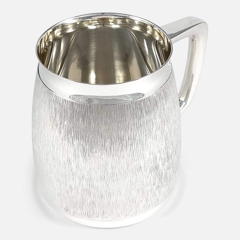 mug viewed with handle angled backwards towards right side