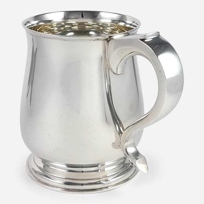 a view of the mug with handle to forefront
