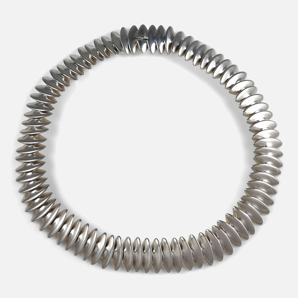a birds eye view of the silver necklace