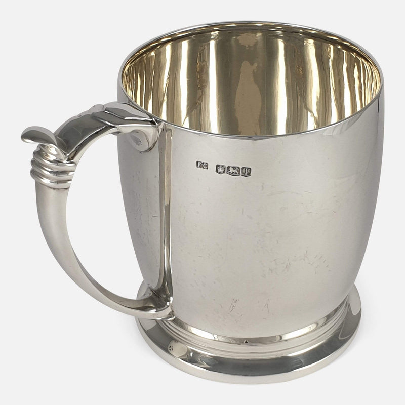 a view of the tankard with the handle to the forefront