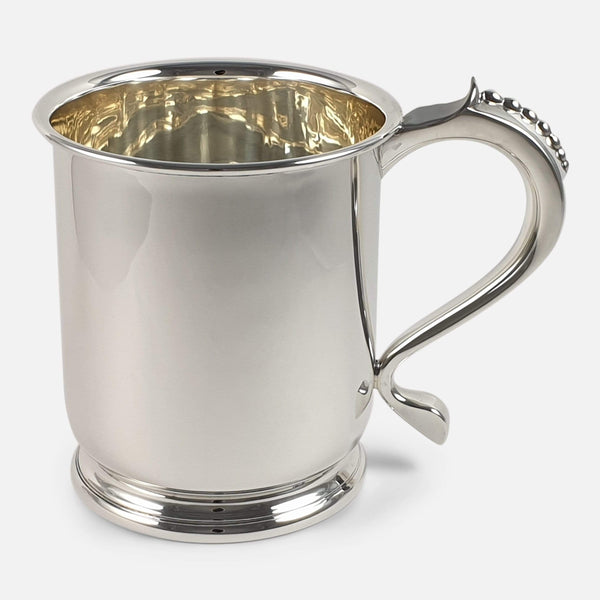 the sterling silver pint tankard by Mappin & Webb viewed side on