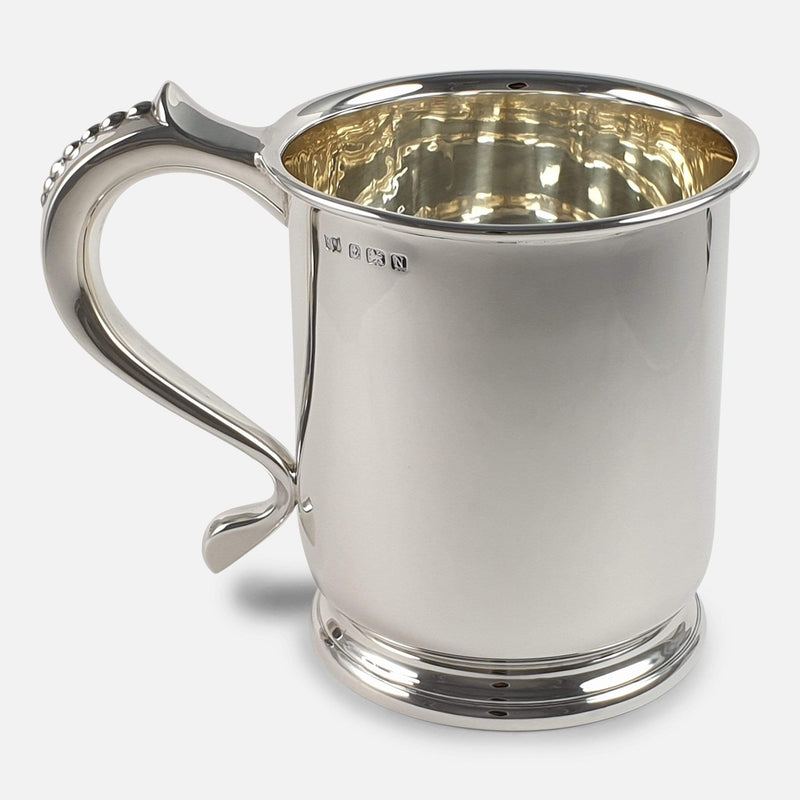 a side on view of the silver tankard