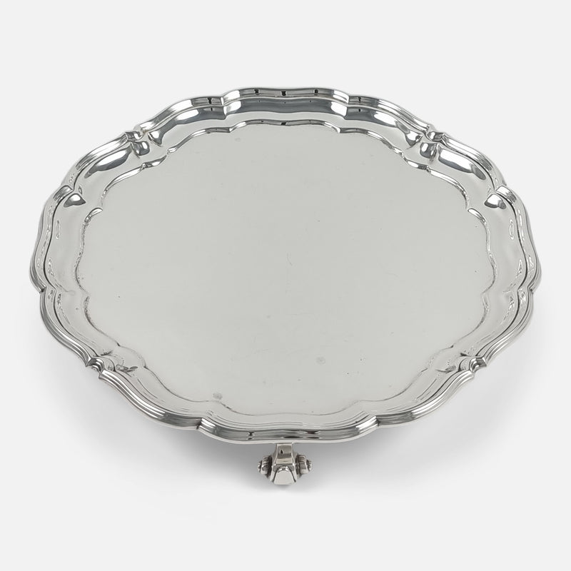 the salver viewed from above with one of the cast feet to the forefront