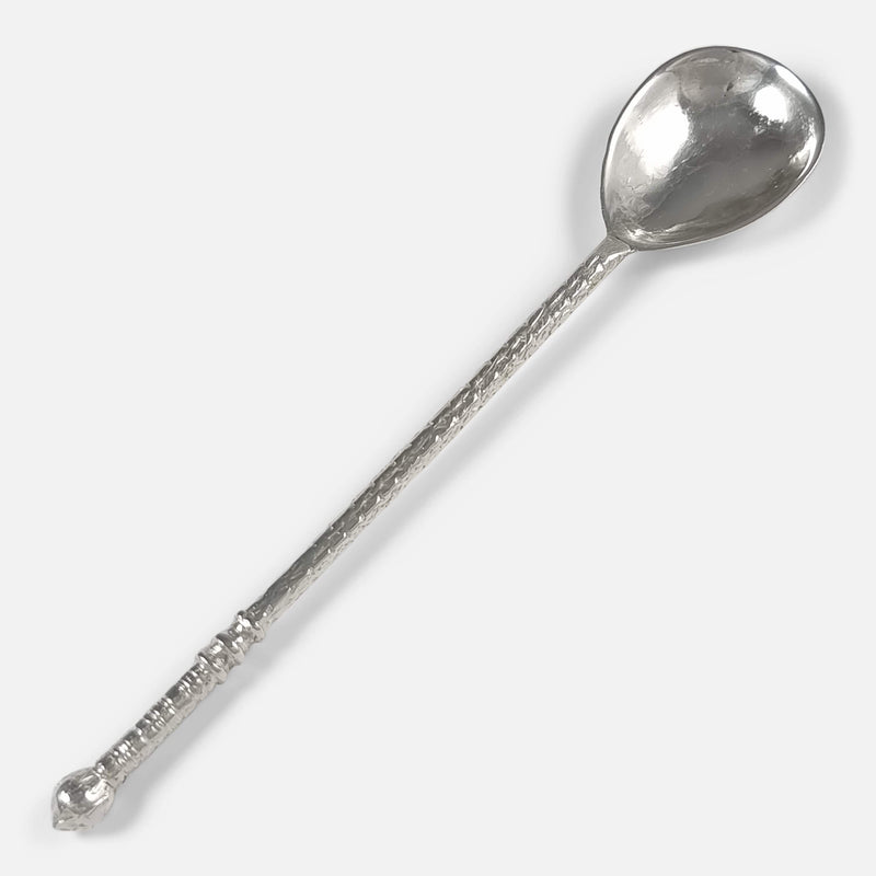 the sterling silver spoon by Amy Sandheim, viewed diagonally