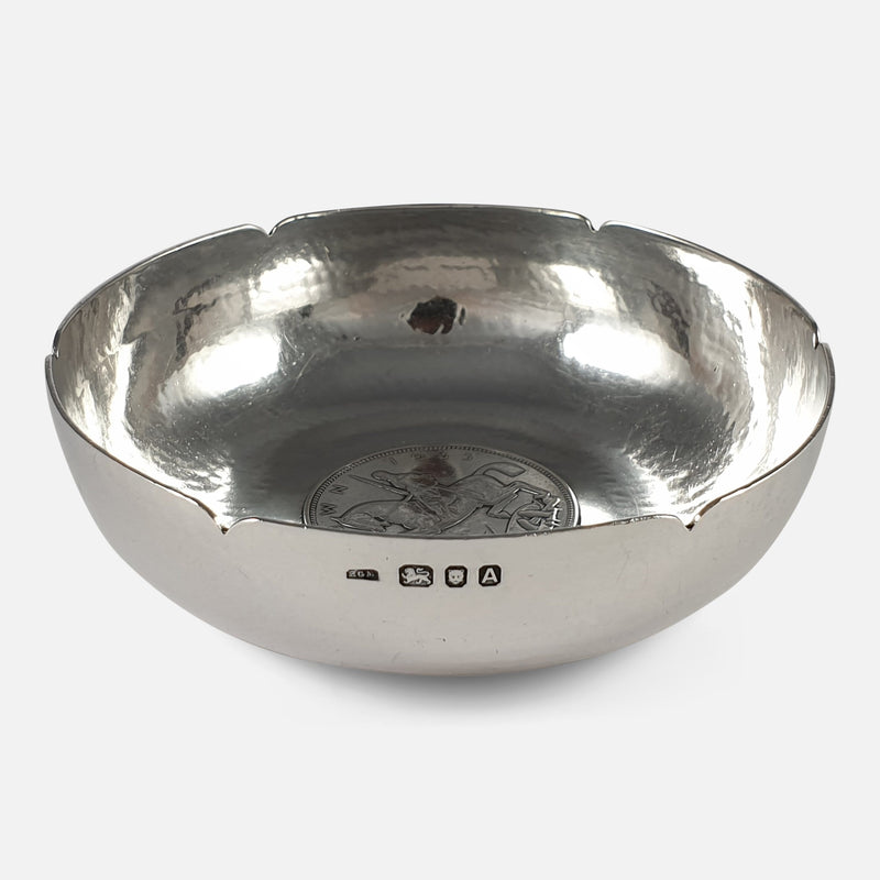 the bowl with silver hallmarks in view